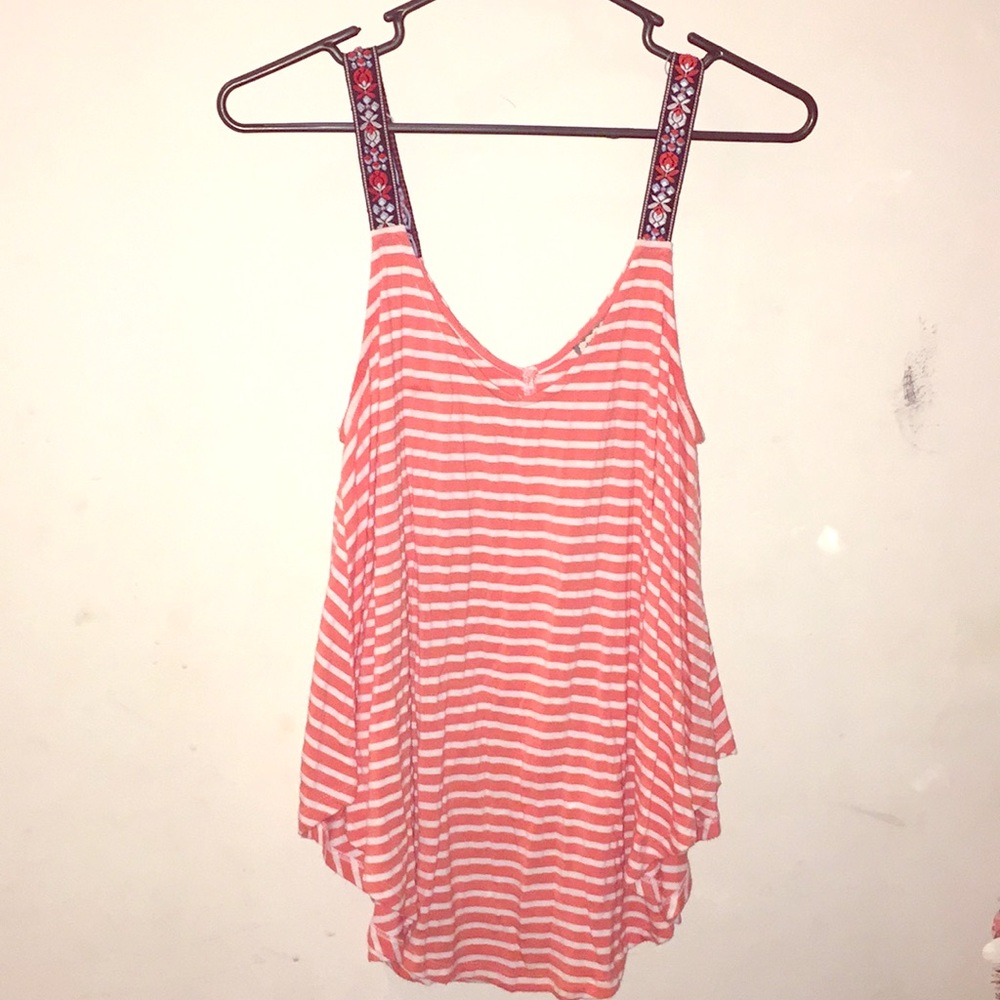 A coral and white horizontal striped tank